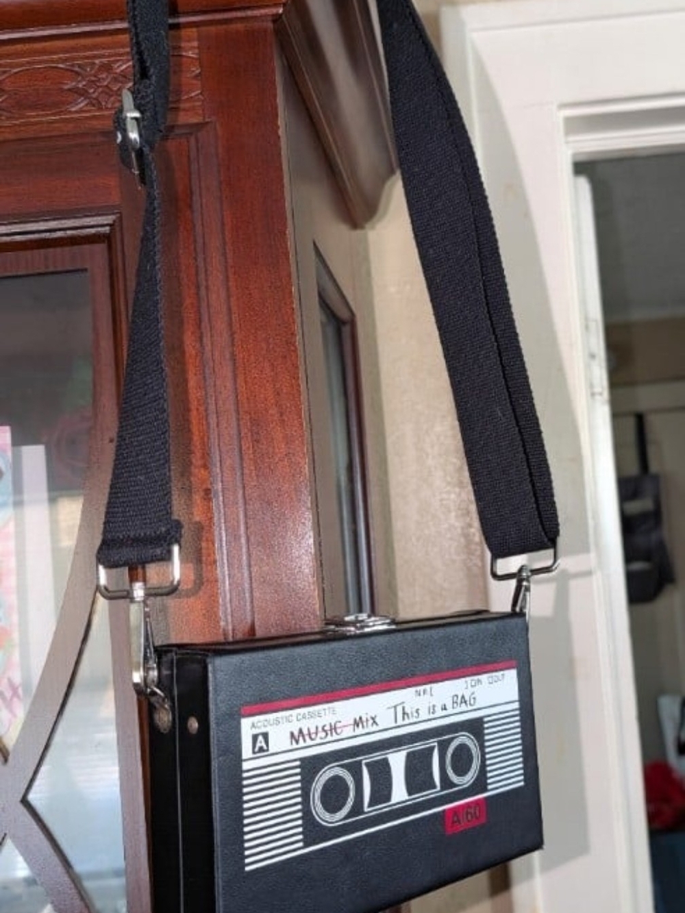 Spencer's Black Cassette Tape Crossbody Bag with Red Accent